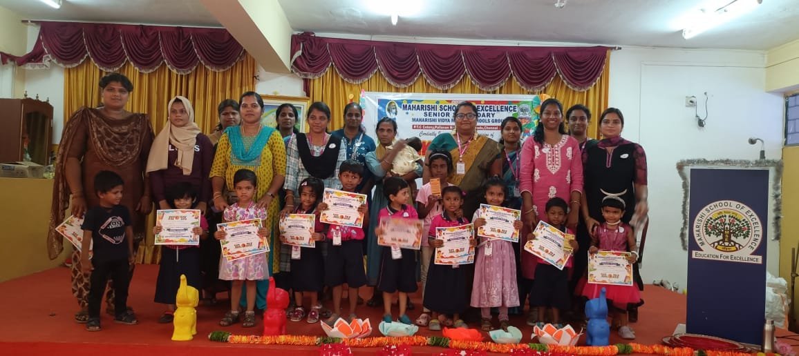 Drizzling Preschool students enjoying a school celebration